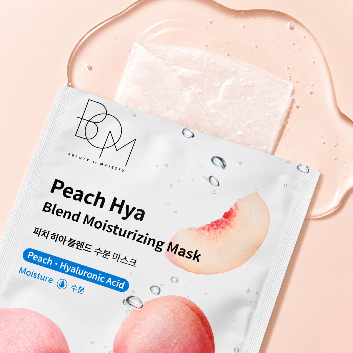 Beauty of Massey Peach Hya Blend Moisturizing Mask in a white foil packet with peach graphics, placed over a translucent sheet mask on a soft peach background with liquid and water droplets.