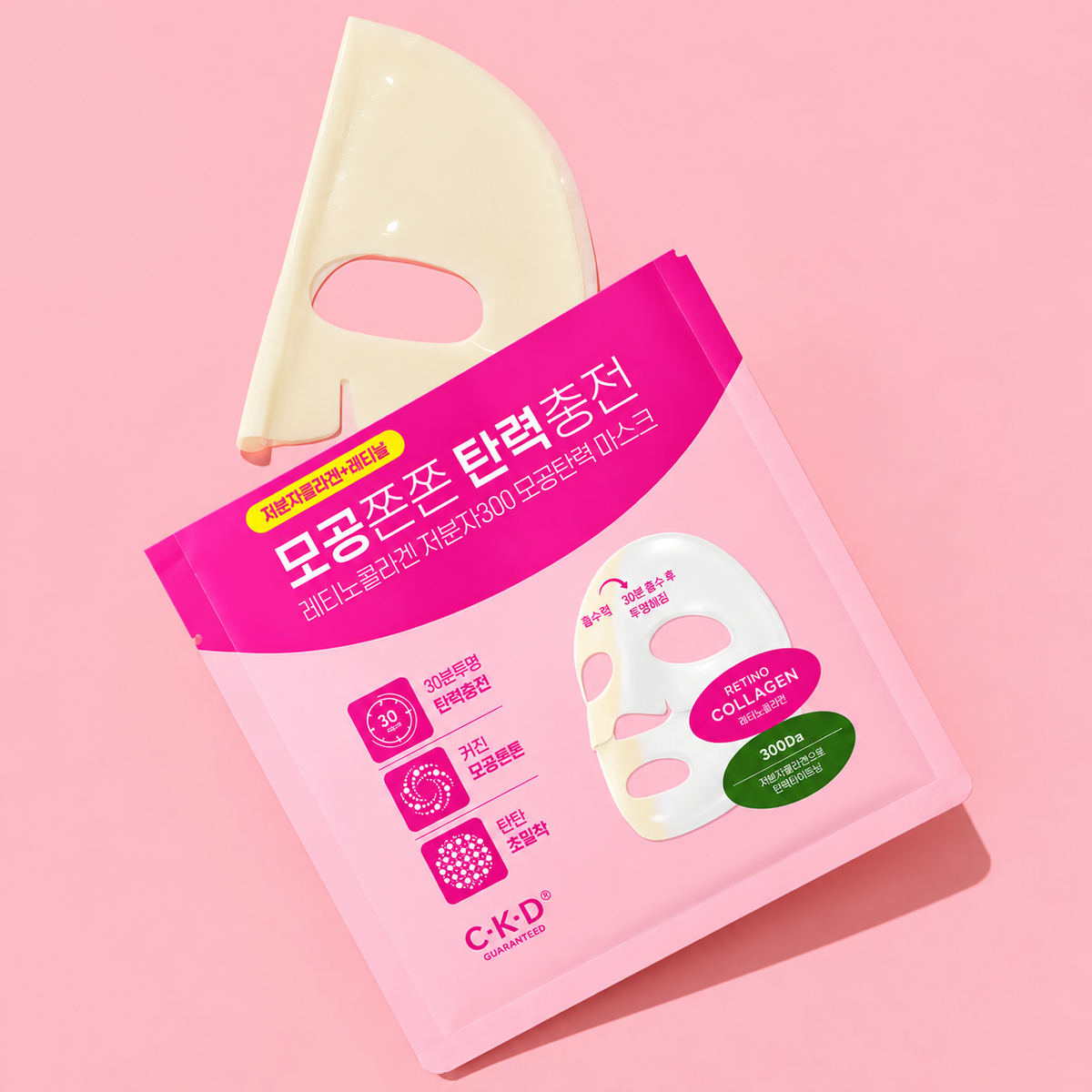 A pink and white package of C-K-D Collagen collagen mask with a cream-colored sheet partially pulled out, set against a solid pink background.