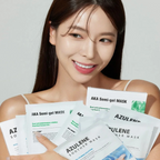 A smiling woman holds several skincare mask packets, including AKA Semi-gel Mask and Azulene Soother Mask, against a clean light gray background.