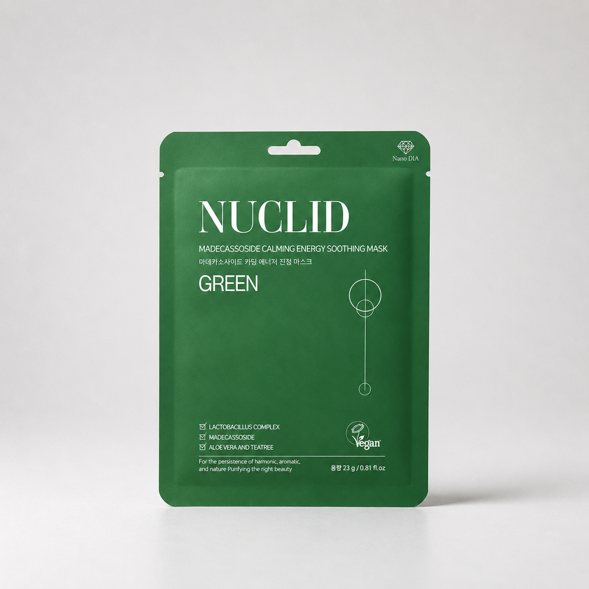 A green stand-up pouch of Nuclid Green Calming Energy Soothing Mask, featuring white text and a minimalist line drawing on a light gray background.