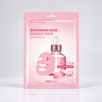 A pink packet of Dermal Shop Bulgarian Rose Essence Mask, featuring a graphic of a pink dropper bottle and a sheet mask on a clean white background.